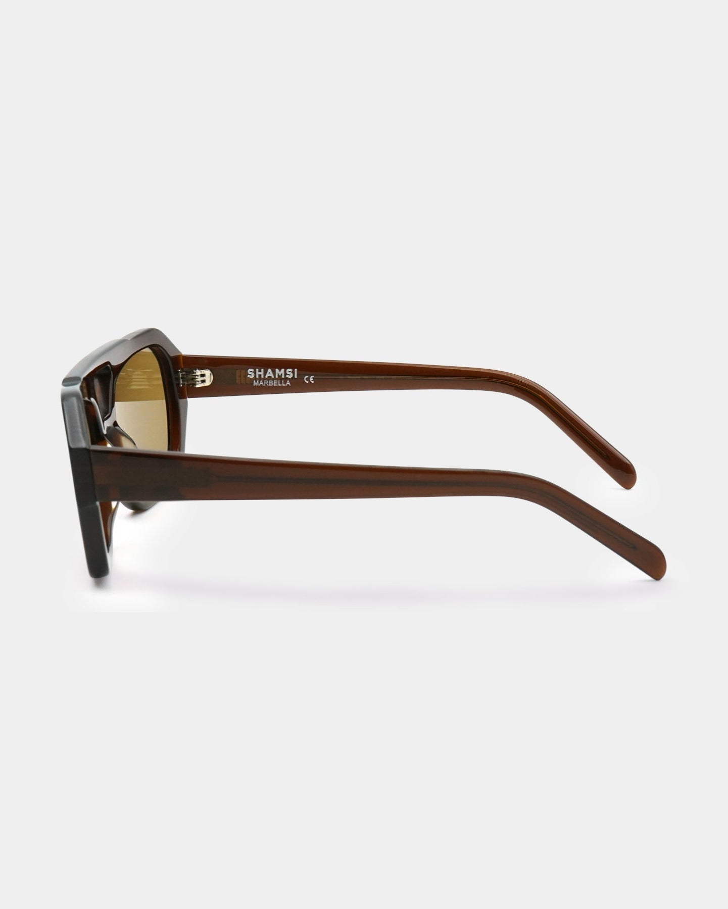 Sunglasses with brown frame and reflective lenses on a white background