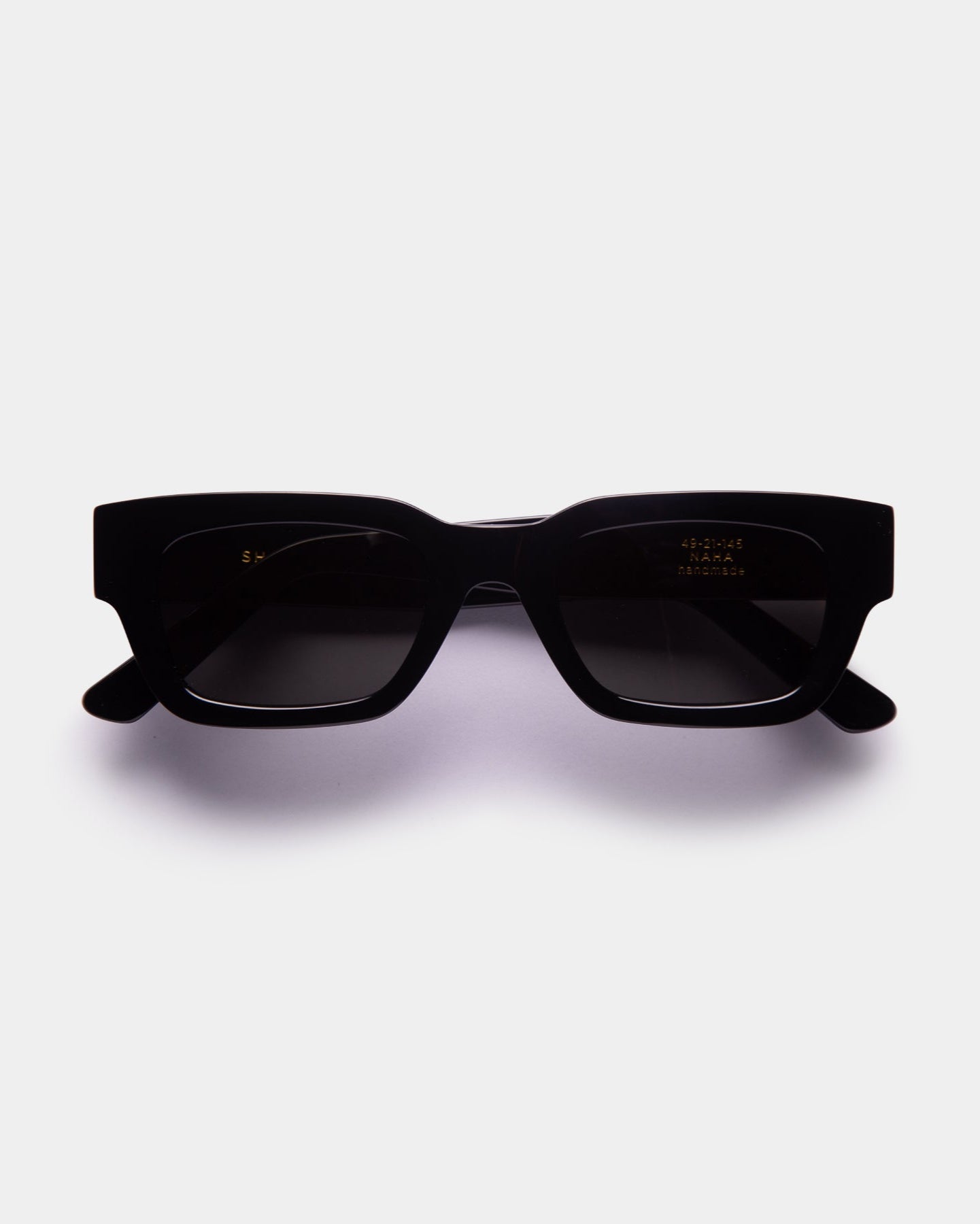 Black sunglasses on a white background