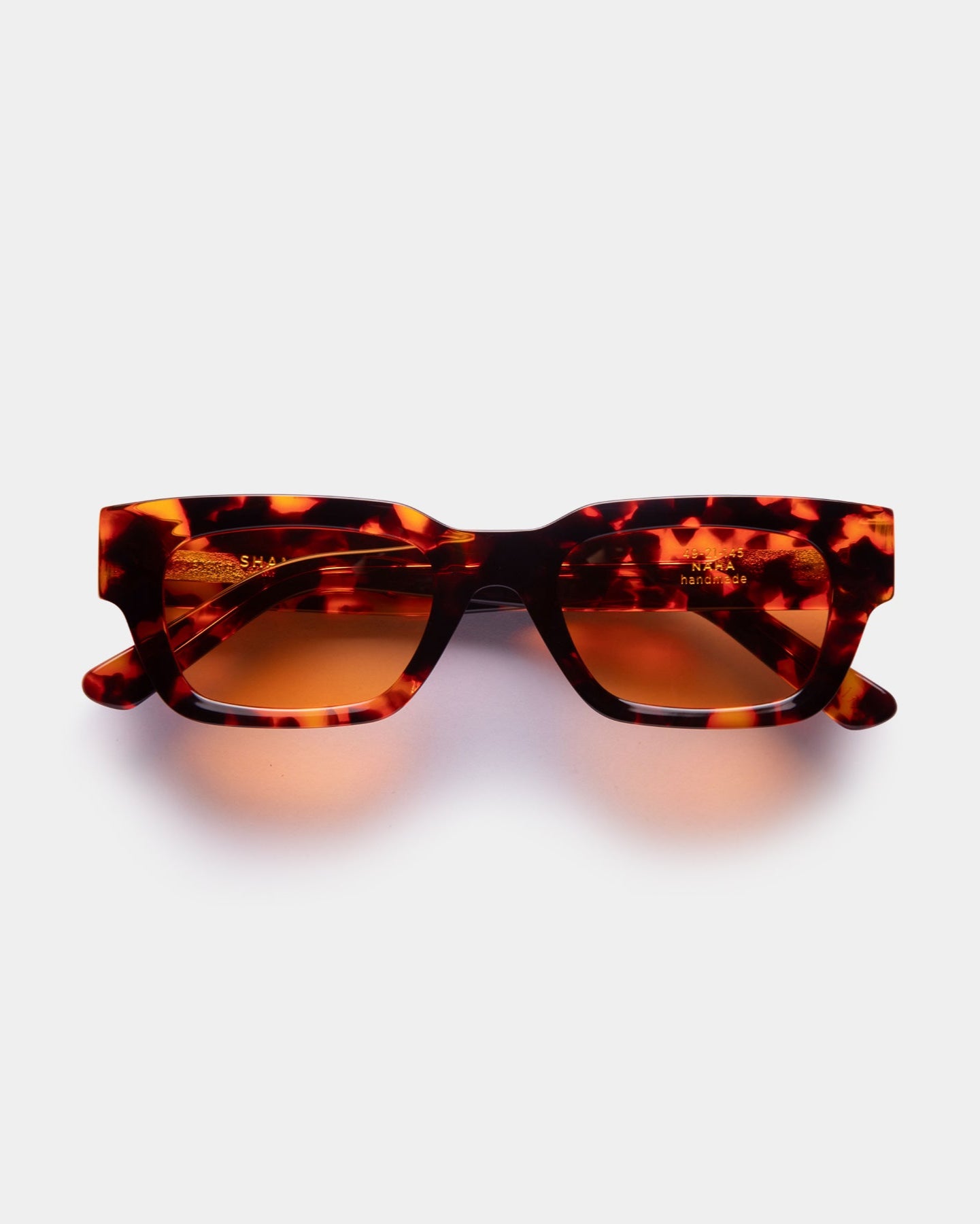 Tortoiseshell sunglasses on a white background