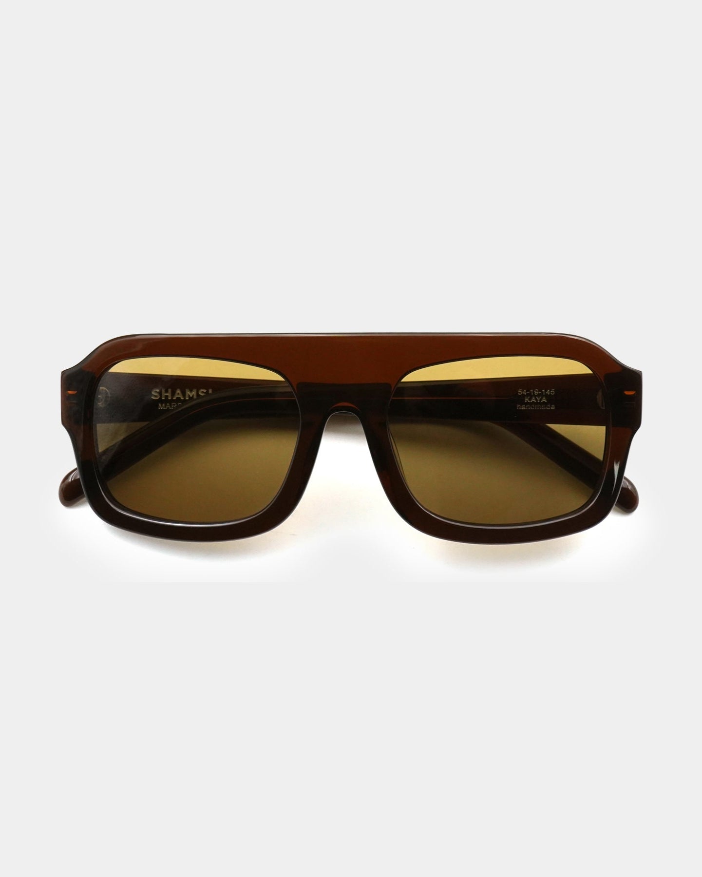 A pair of square-shaped, brown sunglasses with the brand name 'KAYA' visible on the side.