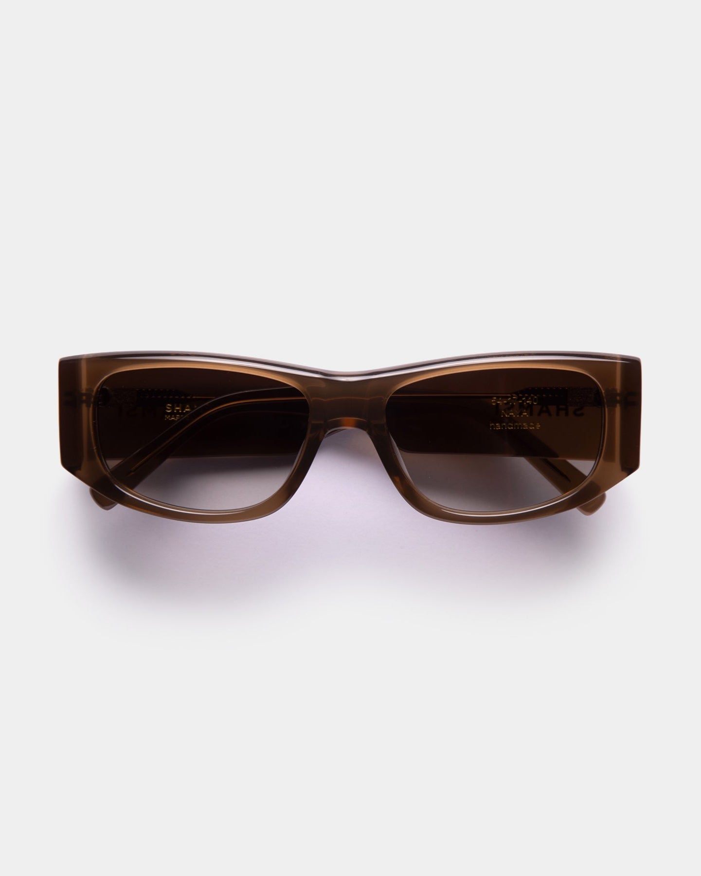 Brown sunglasses on a white background