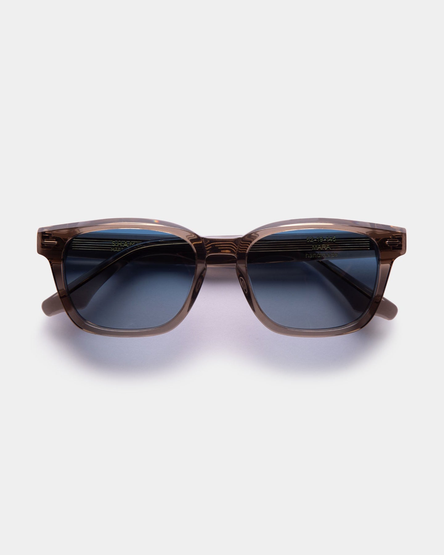 A pair of square-shaped, unisex sunglasses with a brown frame, blue lenses, and a 400 UV-protection label.